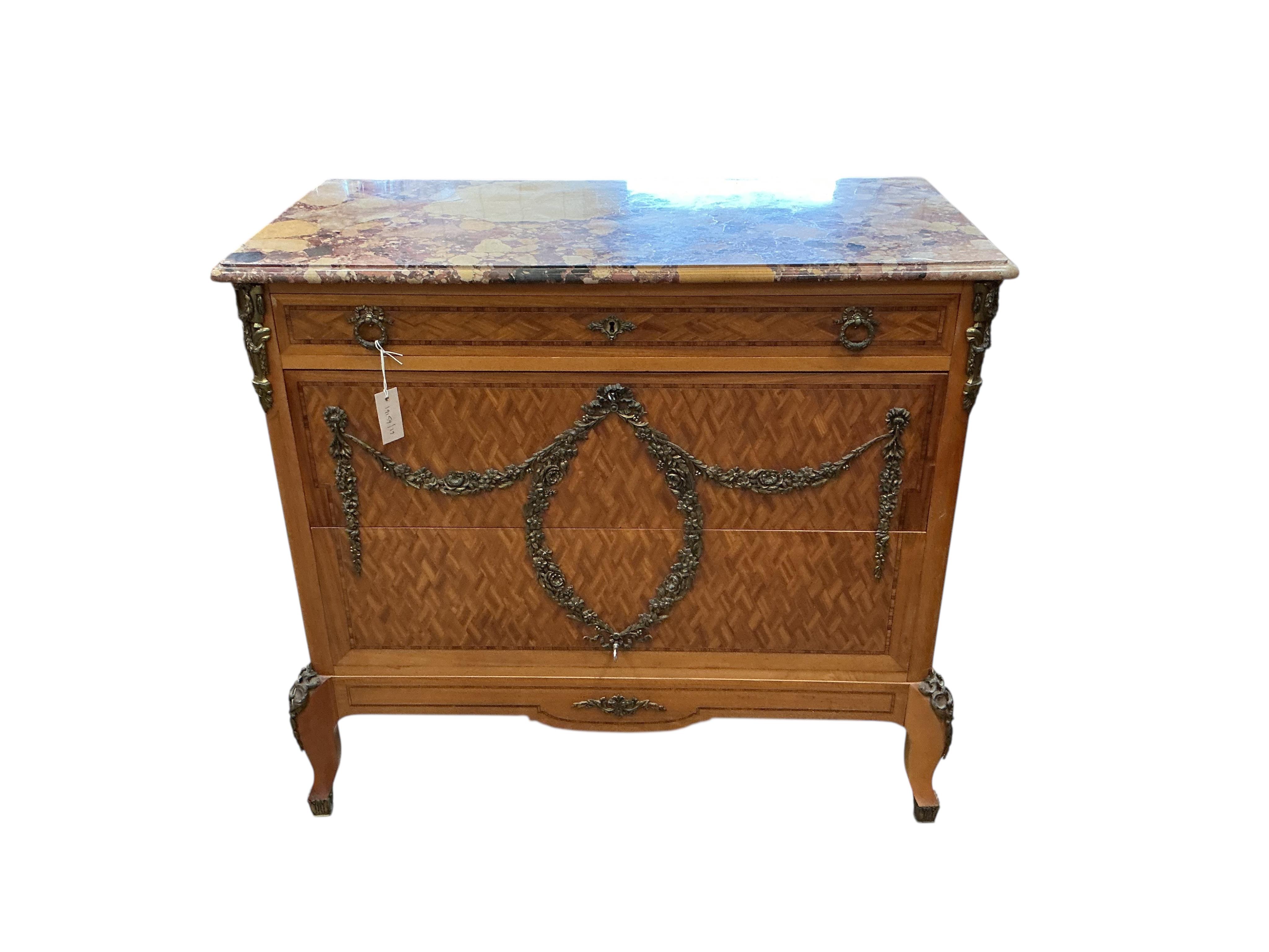 An early 20th century French transition style gilt metal mounted parquetry inlaid marble topped chest, fitted slide, width 99cm, depth 50cm, height 91cm